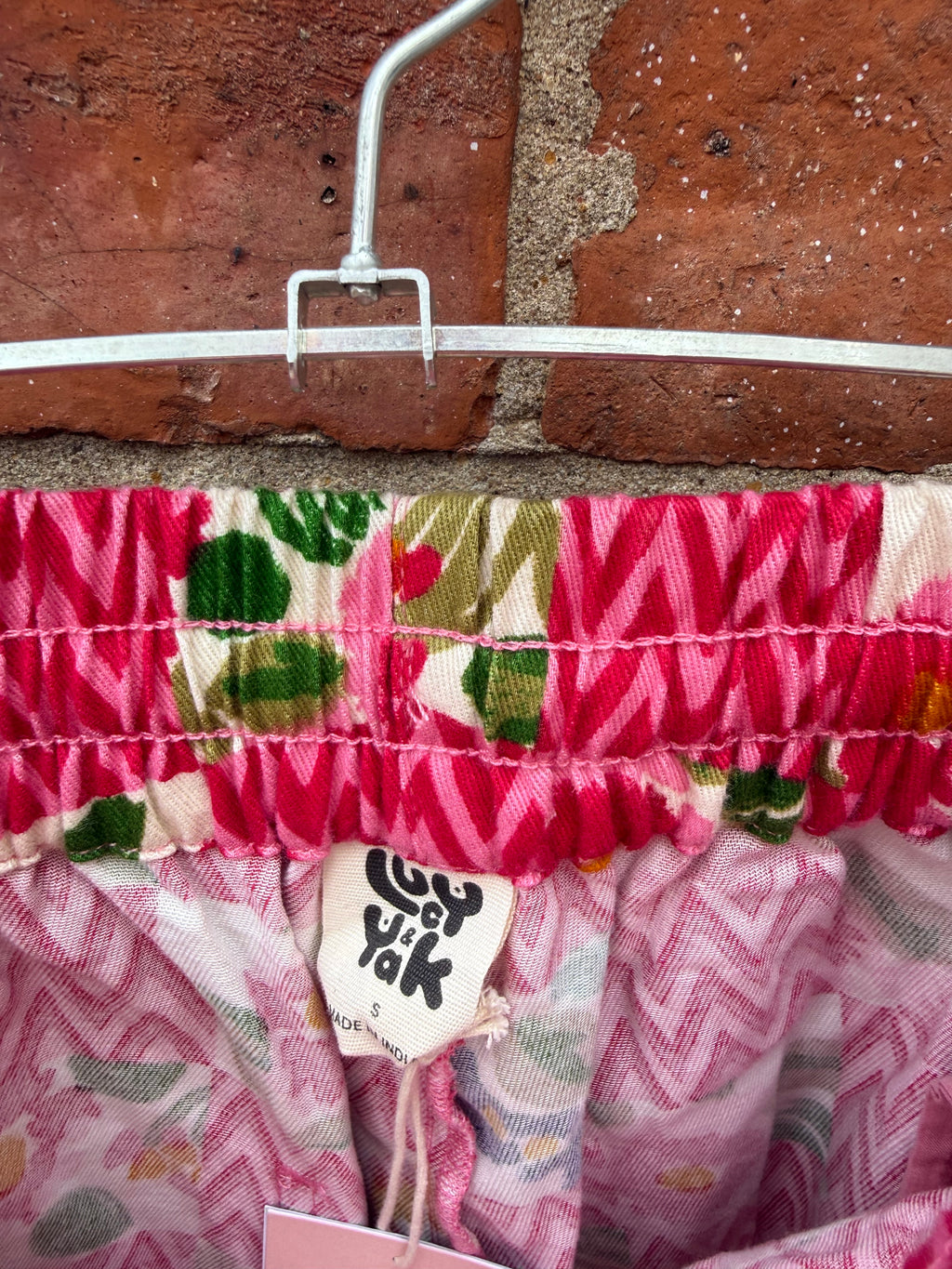 Lucy & Yak cropped pink & floral trousers
